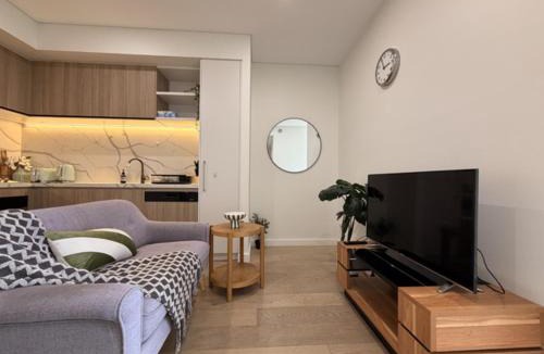 Burwood Apartment | KozyGuru | Burwood | Harbour Bridge-View Apt