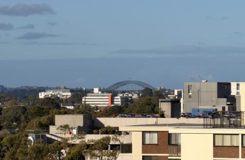 Burwood Apartment | KozyGuru | Burwood | Harbour Bridge-View Apt