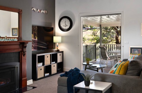 Hepburn Springs House | Lucini Two Outdoor deck, gas log fire