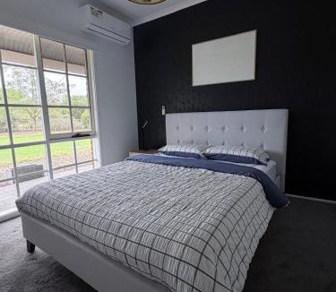 Lara House | Luxe Farmhouse Retreat with Solar Heated Pool and BBQ