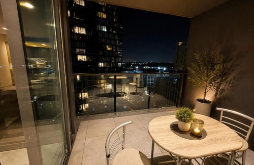 Lidcombe Apartment | Luxurious Pool View at Sydney Olympic Park
