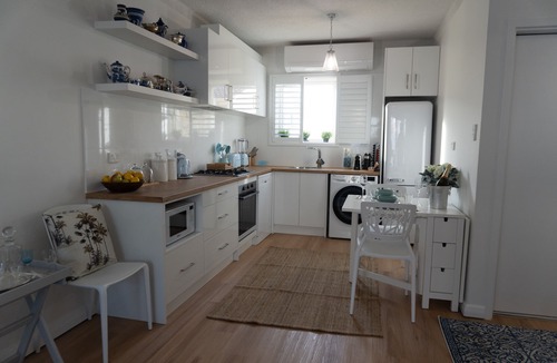 Glenelg North Apartment | Luxury Couples Retreat Beach Front Apt with Ocean View Balcony