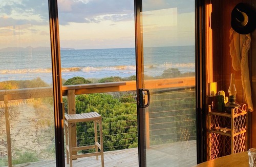 Dolphin Sands House | Mid-century beach front house, on five private acres, dogs welcome
