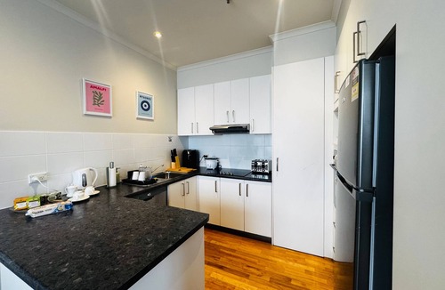 Melbourne Central Business District Apartment | Modern 2BR CBD Apartment w/Balcony Views of Yarra River & Highrises