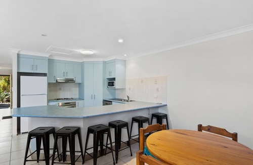 South Evans Head Apartment | Modern family townhouse with pool, BBQ courtyard & central Evans Head location close to shops, river