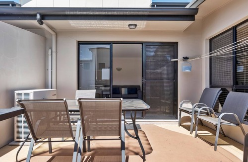 South Evans Head Apartment | Modern family townhouse with pool, BBQ courtyard & central Evans Head location close to shops, river