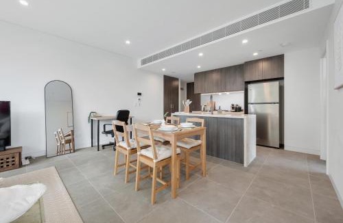 Lidcombe Apartment | Modern Getaway with Stunning Accor Stadium Views