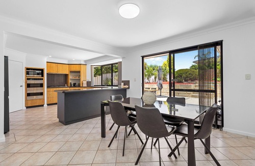 Dianella House | Monaco Family Retreat is a spacious, elevated haven designed with families in mind. Featuring generous bedrooms, multiple bathrooms, and relaxed living areas, it offers room for everyone to unwind in comfort.