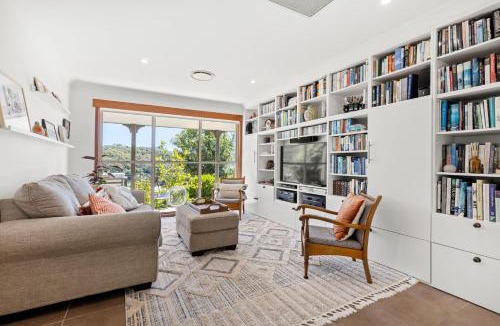 Broughton Village House | Moonraker - Fireplace with Swimming Pool