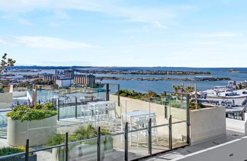 Newcastle West Apartment | Newcastle City Stay - Pool, Private Cinema and Rooftop