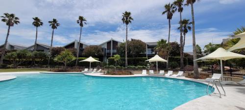 Magenta Shores House | Oceanfront Oasis | Stylish 4BR w/Epic Terrace