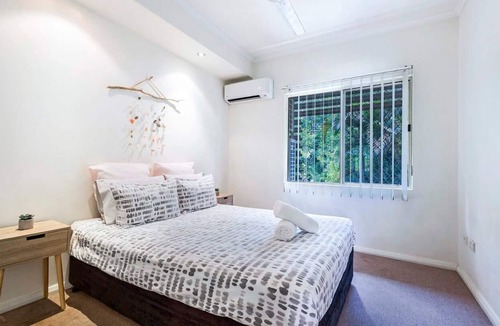Parap Apartment | Palm Reflections in Parap with Tree lined Alfresco