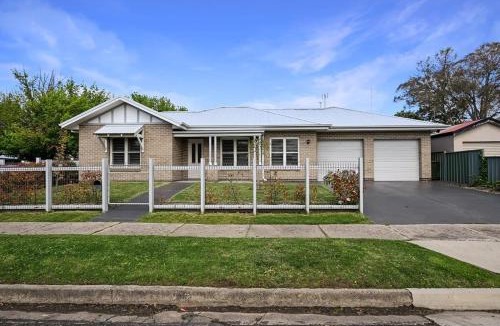 Orange House | Paradise on Prince - Sleek & Stylish, Dog Friendly