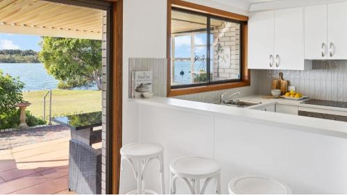 Yamba Apartment | Peninsula Court Unit 10 - Waterfront Unit with Pool & River Views - Holiday Yamba