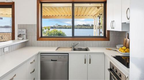 Yamba Apartment | Peninsula Court Unit 10 - Waterfront Unit with Pool & River Views - Holiday Yamba