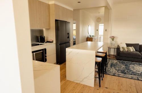 Tighes Hill House | Pet-Friendly 3BR Home with Workspace & Creek Views