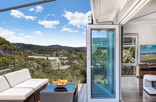 Copacabana House | Pier 26. New property with views, home movie theatre and steam room.