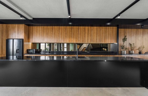 Patterson Lakes House | Prime Riverfront View with Architectural Excellence.