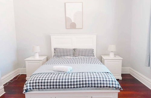 Midland House | Queen Bedroom1 - Heritage Charm Meets Modern Ease