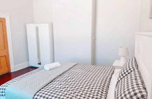Midland House | Queen Bedroom1 - Heritage Charm Meets Modern Ease