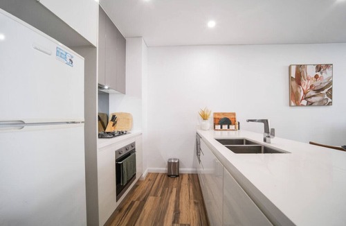 Rosebery Apartment | Resort-Style 2BR Escape Pool, Gym, Sauna, Parking