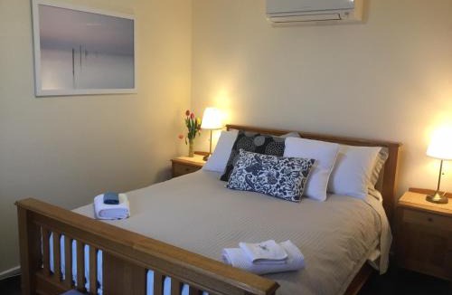 Table Cape House | Skyescape on Northshore Queen Bedroom