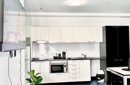 Adelaide Central Business District Apartment | Skyline View on Synagogue – Comfortable City Apartment in Adelaide's East End