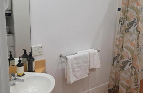 Darwin City Centre Apartment | Stylish Resort Stay with King Bed, Pool and Outdoor Patio