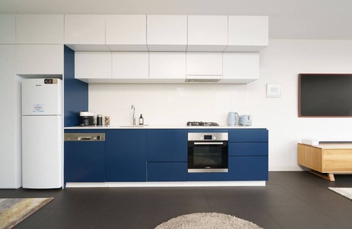City West Apartment | Stylish Top-Floor Apt with Lake and Mountain Views