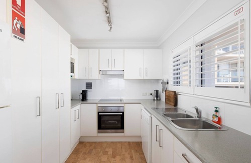Shoal Bay Apartment | Sundeck Shoal Bay Ground floor with views and pool access