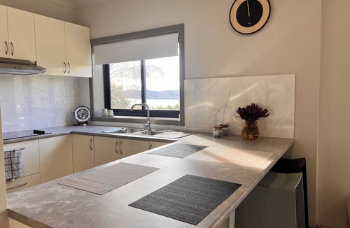 Sandy Bay Apartment | Sunny Vista Bliss