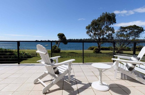 Clarence Point House | Sunset Sanctuary: Waterfront Home with Balcony and Patio
