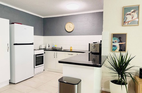 Port Macquarie Apartment | Surf Street Retreat. Moments from the beach and delicious eateries.