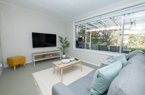 Glenroi House | Sweet Caroline. Sunroom & Garden. Orange.