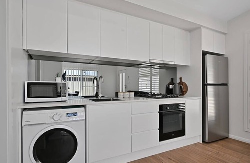 Orange Apartment | The Elm Apartments - The Blue Room