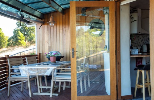 Cygnet House | The Roundhouses. Strawbale luxury accommodation on a small hobby farm.