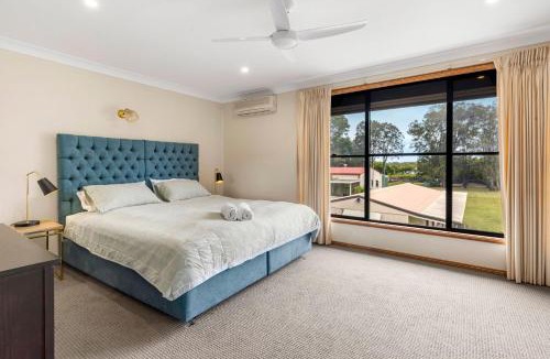 Culburra Beach House | The Waters Edge - Pet Friendly with Fire Pit