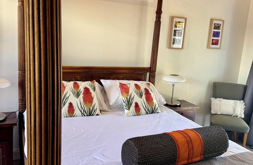 York House | The York Wildflower room with four poster bed in historic York town centre