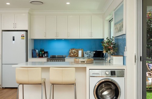 Mollymook Beach House | Treetop Tides - Pet-friendly Stay in Mollymook Beach