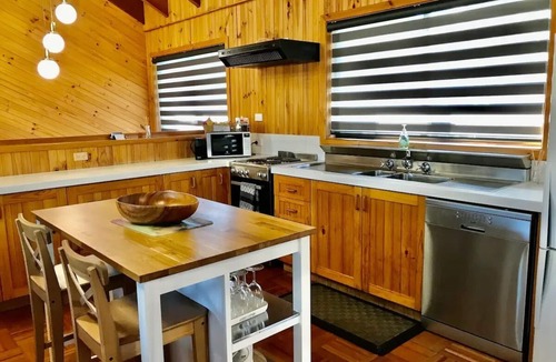 Tuross Head House | Unwind in a stylish 3 bedroom home. Within an easy stroll to beach park & shops.