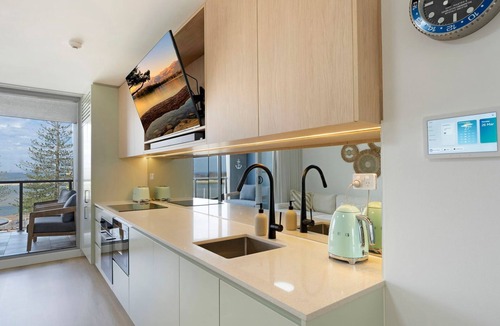 The Entrance Apartment | Waterfront, Pool, Balcony, Prime Location