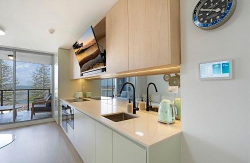 The Entrance Apartment | Waterfront, Pool, Balcony, Prime Location