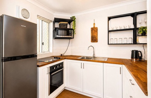 Fremantle Apartment | Welcome to Magical McAtee, a stylish resort-style apartment just 5 minutes from the heart of Fremantle. Relax by the sparkling pool, enjoy a luxurious king bed, free parking, fast Wi-Fi and a fully equipped kitchen. Perfect for couples, famil