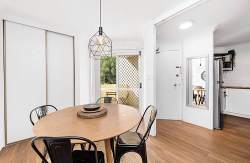 Fremantle Apartment | Welcome to Magical McAtee, a stylish resort-style apartment just 5 minutes from the heart of Fremantle. Relax by the sparkling pool, enjoy a luxurious king bed, free parking, fast Wi-Fi and a fully equipped kitchen. Perfect for couples, famil