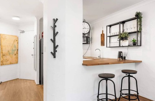 Fremantle Apartment | Welcome to Magical McAtee, a stylish resort-style apartment just 5 minutes from the heart of Fremantle. Relax by the sparkling pool, enjoy a luxurious king bed, free parking, fast Wi-Fi and a fully equipped kitchen. Perfect for couples, famil