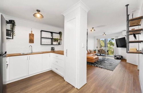 Fremantle Apartment | Welcome to Magical McAtee, a stylish resort-style apartment just 5 minutes from the heart of Fremantle. Relax by the sparkling pool, enjoy a luxurious king bed, free parking, fast Wi-Fi and a fully equipped kitchen. Perfect for couples, famil