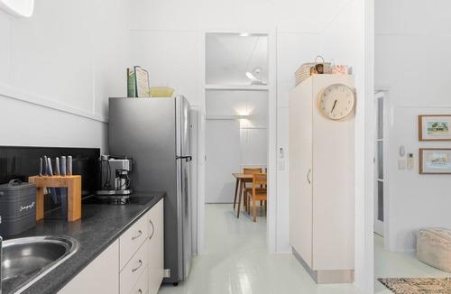 Newell House | White & Black Cockatoo by the Sea