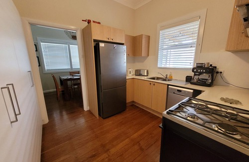 Port Macquarie House | Whole House WiFi Sundecks. Walk to Flynn's Beach + Dining. Family + Dog Friendly