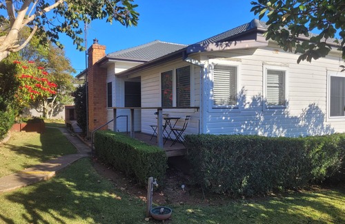Port Macquarie House | Whole House WiFi Sundecks. Walk to Flynn's Beach + Dining. Family + Dog Friendly