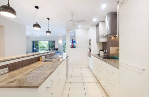 Nightcliff Apartment | Zen Saltwater Retreat: balcony ~ pool ~ seaview